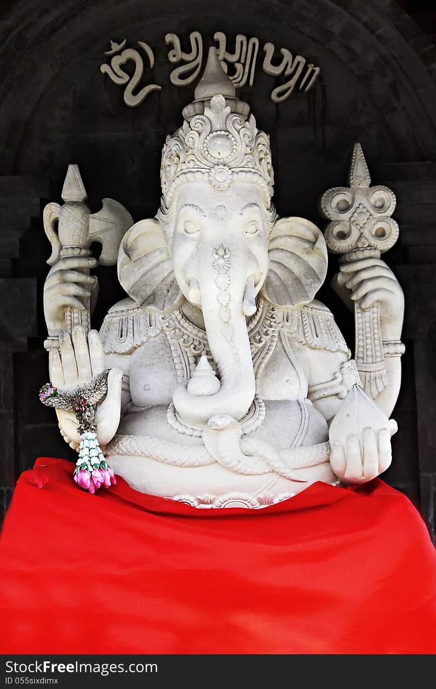 BALI, INDONESIA - FEBRUARY 26: White Ganesha statue at Ulun Danu temple on February, 26, 2011, Bali, Indonesia. Ganesha is a most powerful hindu god. BALI, INDONESIA - FEBRUARY 26: White Ganesha statue at Ulun Danu temple on February, 26, 2011, Bali, Indonesia. Ganesha is a most powerful hindu god.