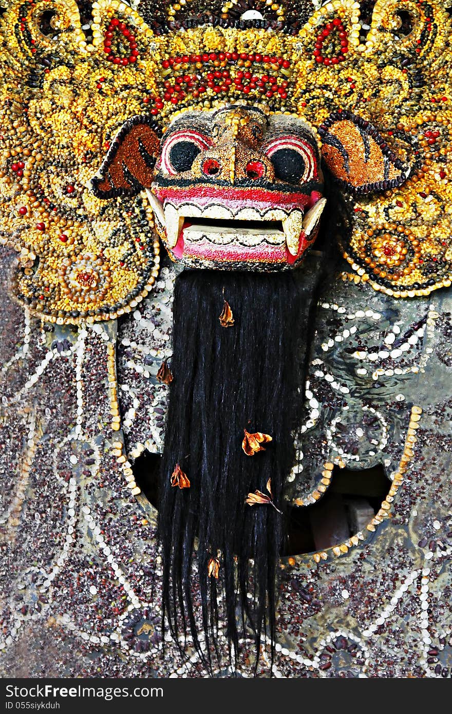 BALI, INDONESIA - FEBRUARY 26: Ornate monster statue at Ulun Danu temple on February, 26, 2011, Bali, Indonesia. BALI, INDONESIA - FEBRUARY 26: Ornate monster statue at Ulun Danu temple on February, 26, 2011, Bali, Indonesia