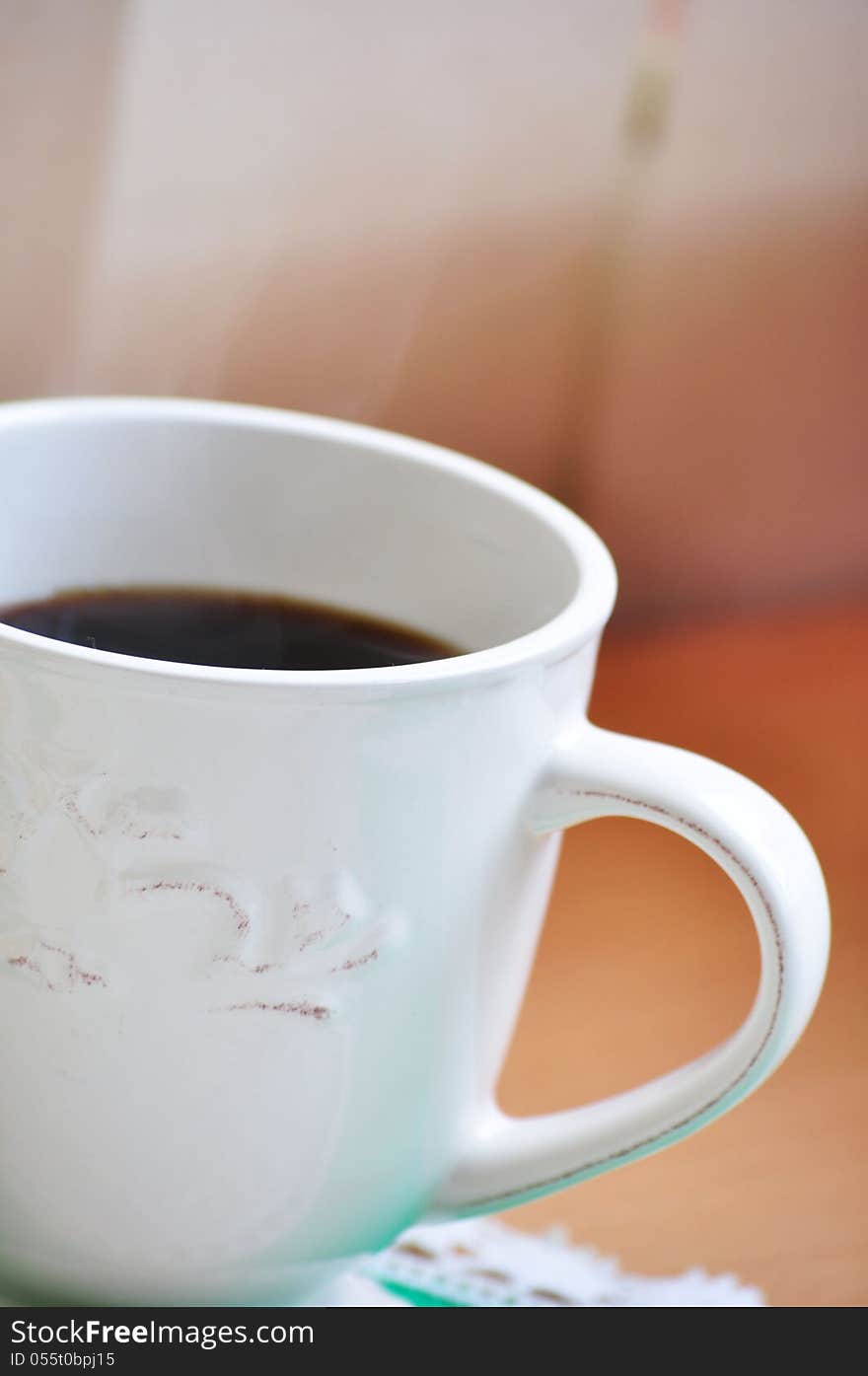 Natural photo of a cup of coffe.