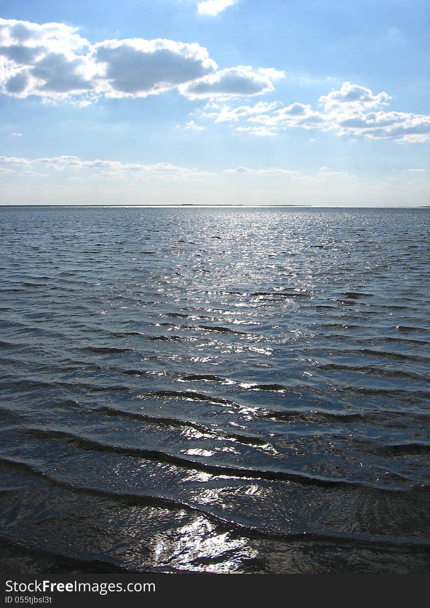 Panorama of the everning sea with clouds