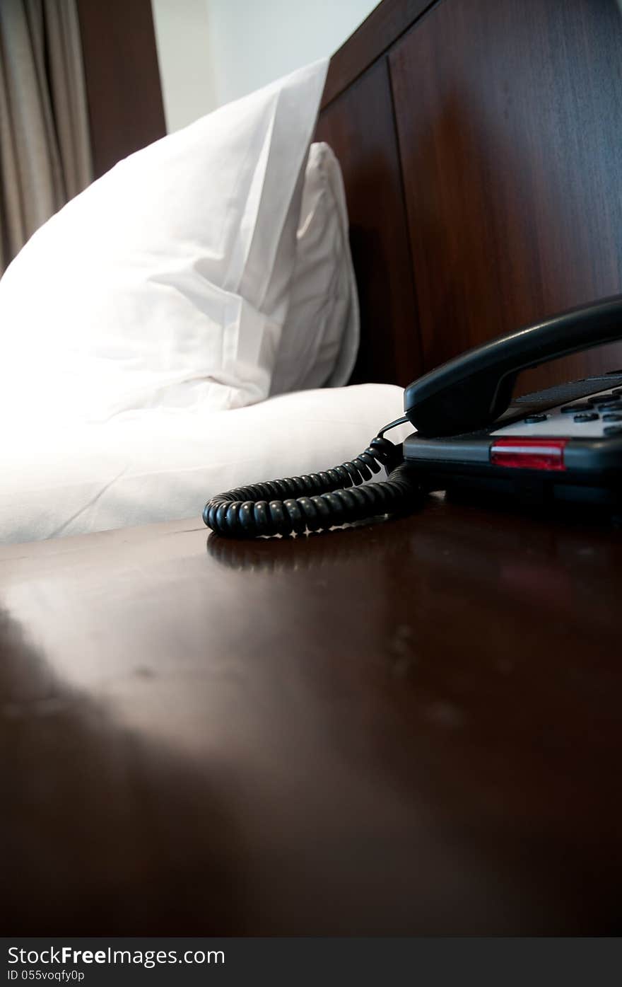 Bedroom with telephone in front