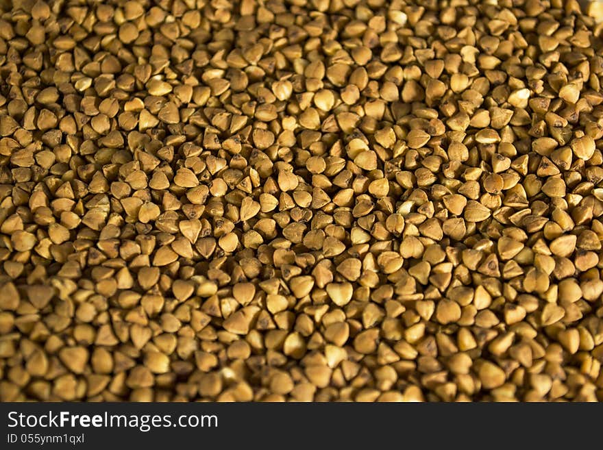 Brown buckwheat texture closeup background