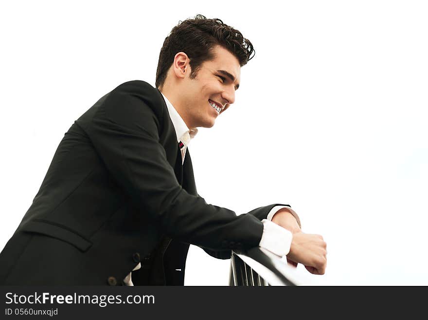 Young businessman in urban background