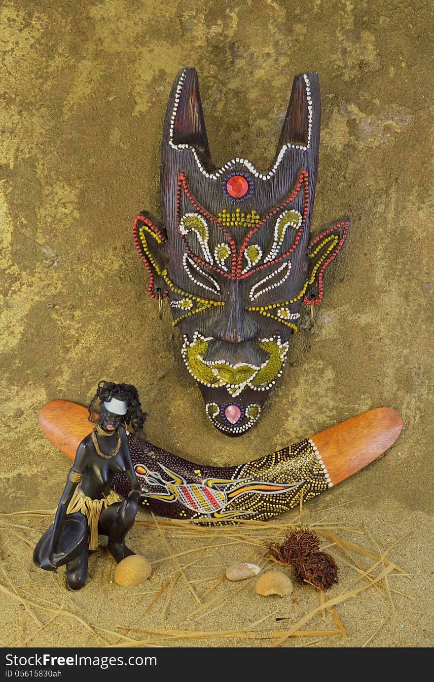 Composition with scary african mask and boomerang. Composition with scary african mask and boomerang