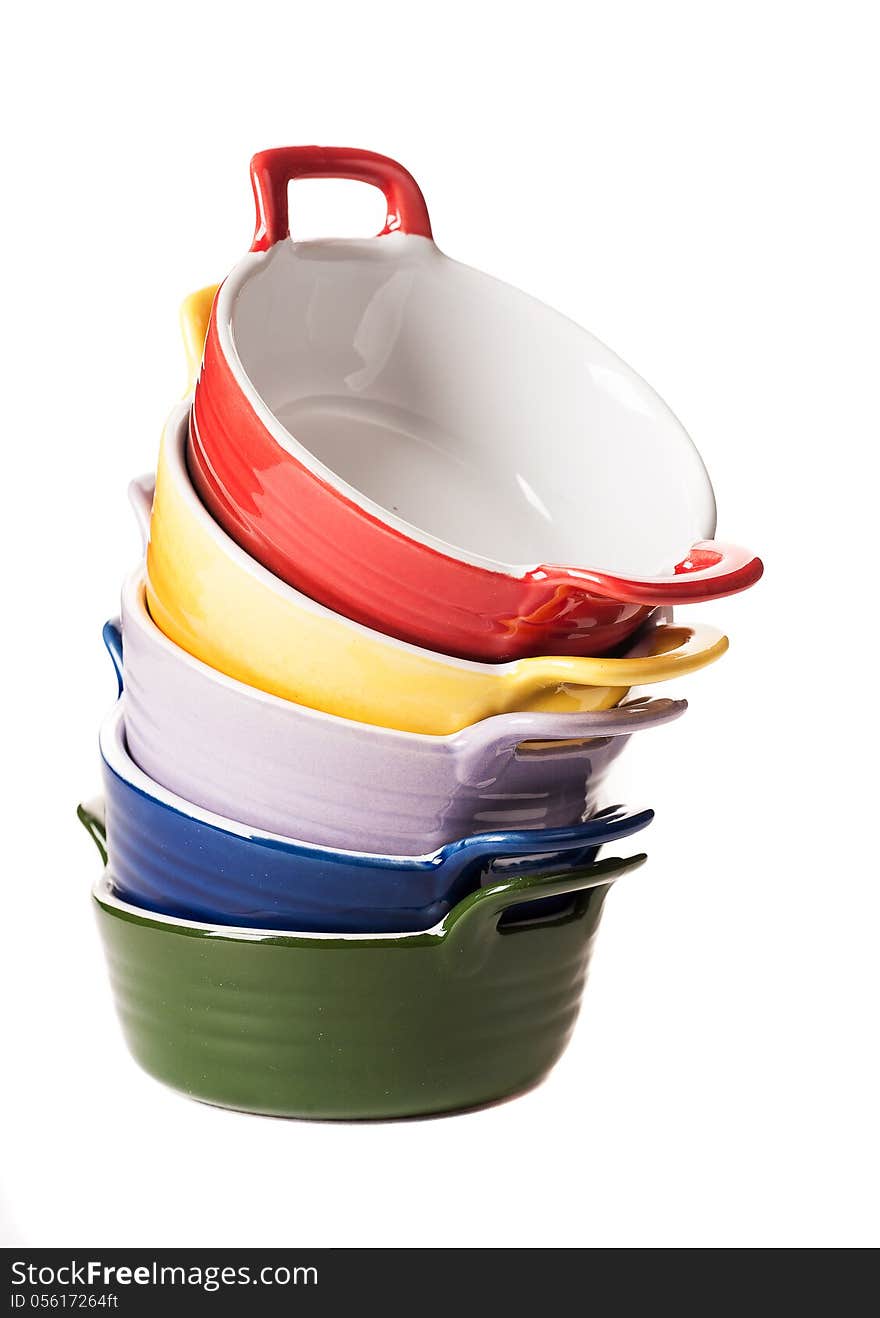 Assorted colorful bowls on white background. Assorted colorful bowls on white background