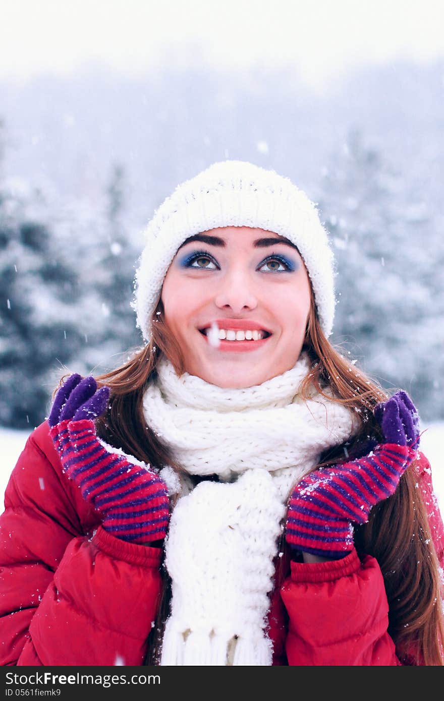 Outdoor sensual portrait of pretty young woman in winter park. Outdoor sensual portrait of pretty young woman in winter park