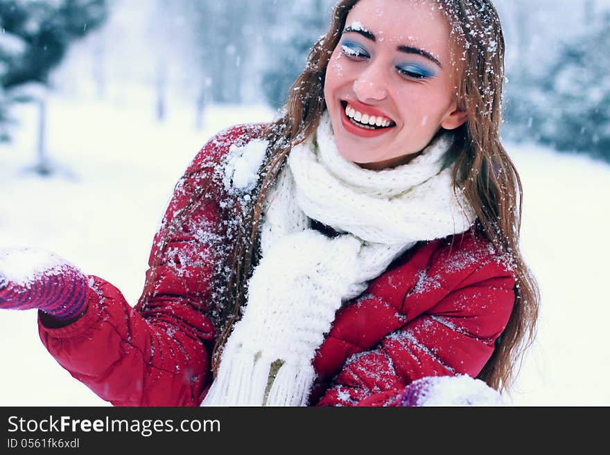 Sensual portrait of pretty woman in winter park