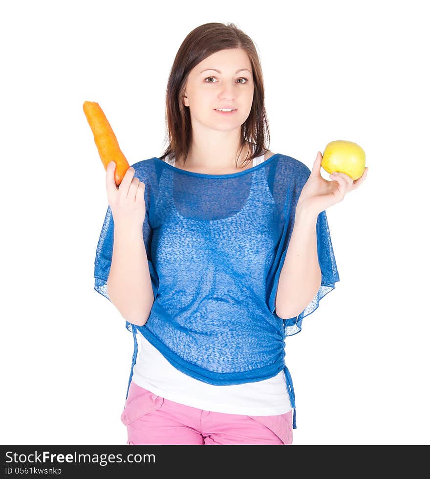 Young Woman Chose Between Apple And Carrot Over White Background