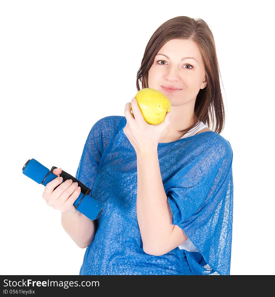 Beautiful young woman with green apple over white background.