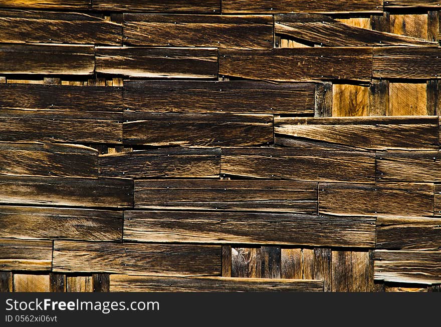 Old aged wooden walls of the buildings as background