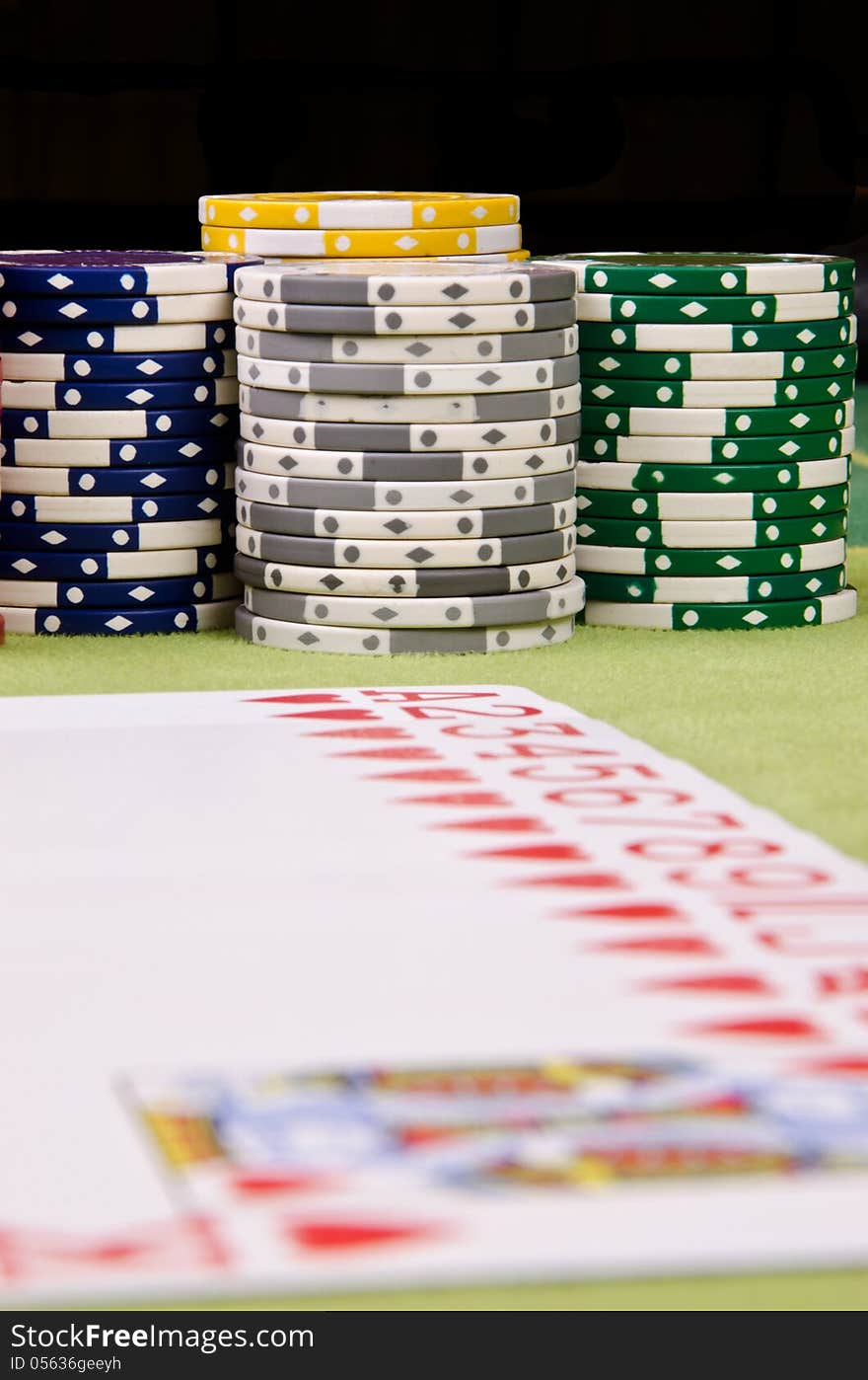 Poker cards and chips are on the table.