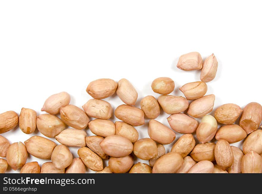 Raw peanuts isolated on white background