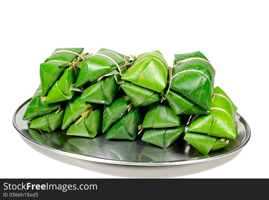 Khao Tom Mad, Thai dessert, steamed sticky rice with banana isolated