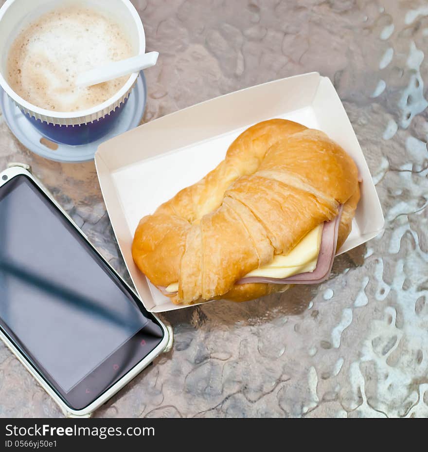 Ham cheese croissant placed on the table. Ham cheese croissant placed on the table.