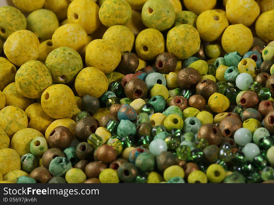 Mixed clay and glass beads collection.