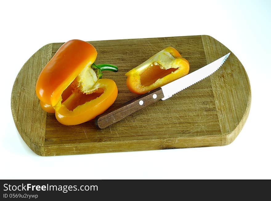 Yellow pepper on cutting board