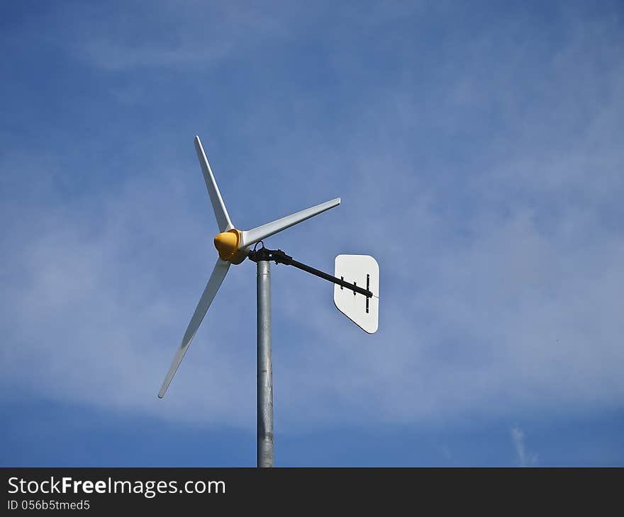 Weathervane turn follow wind in cloudy sky