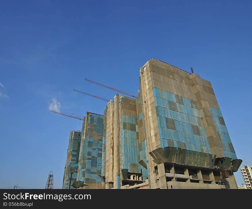 Construction of arrange high building in sunny day. Construction of arrange high building in sunny day