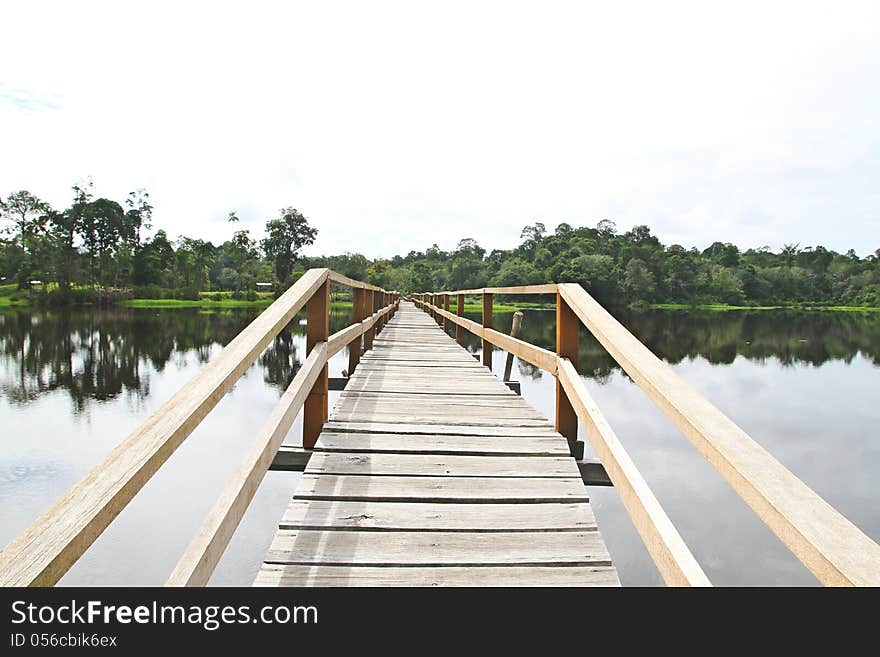 Lonely Jetty across the field of water