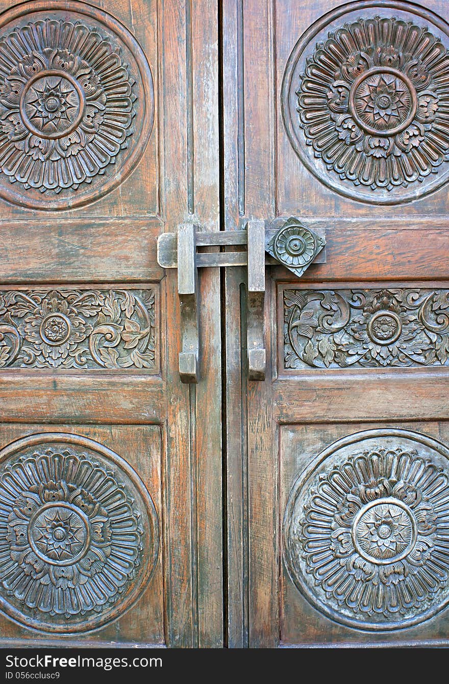 Old ancient gate. Brown antique wooden bolts. Old ancient gate. Brown antique wooden bolts.