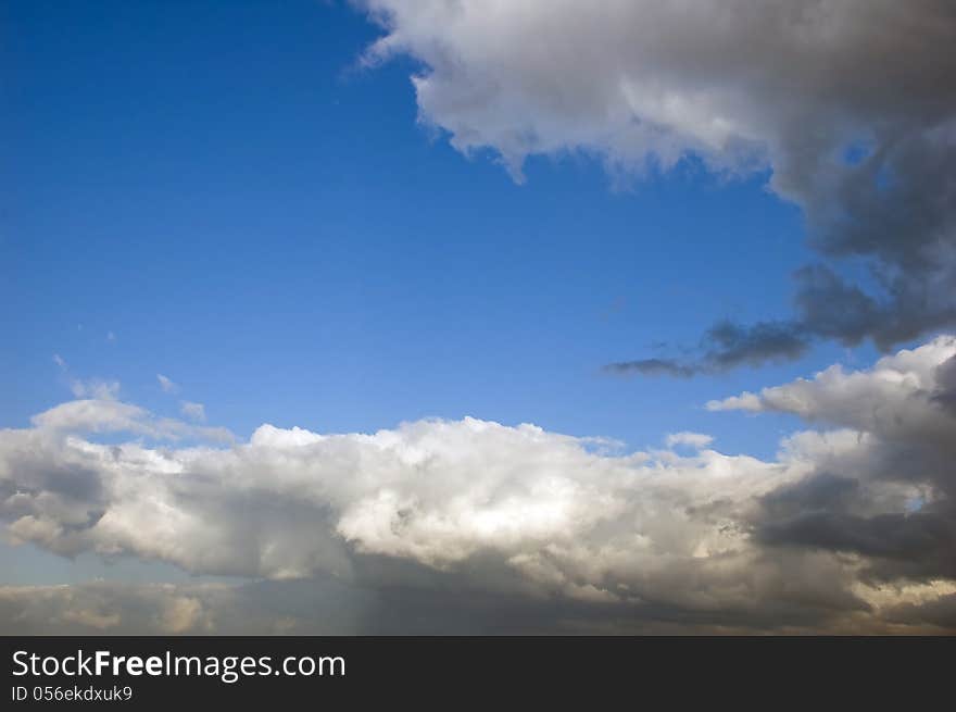 Blue sky and with dark clouds. Blue sky and with dark clouds