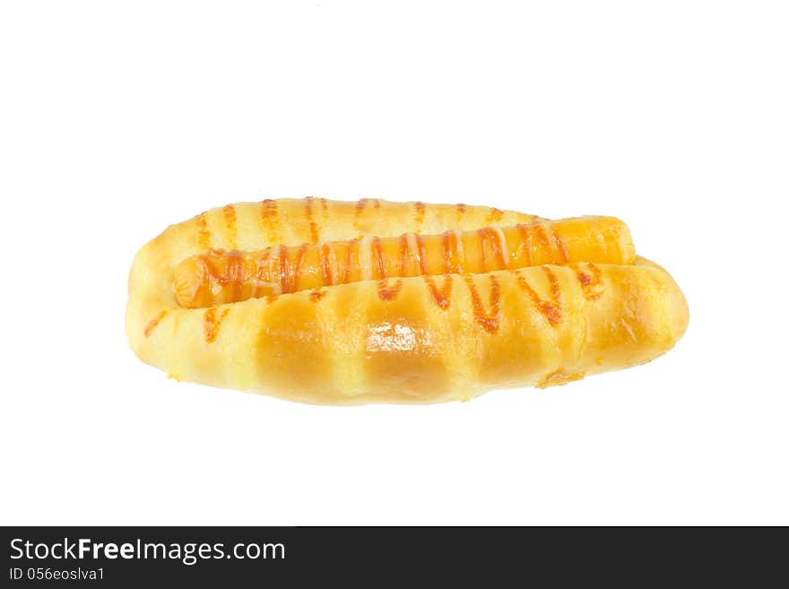 Baked bread and sausage isolated on white background