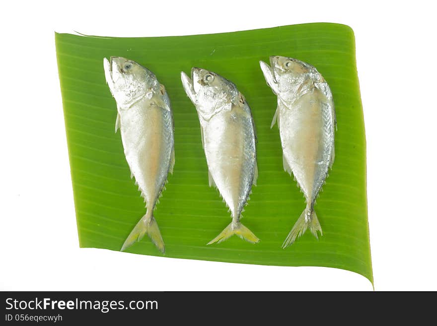 Mackerel fishes on banana leaf