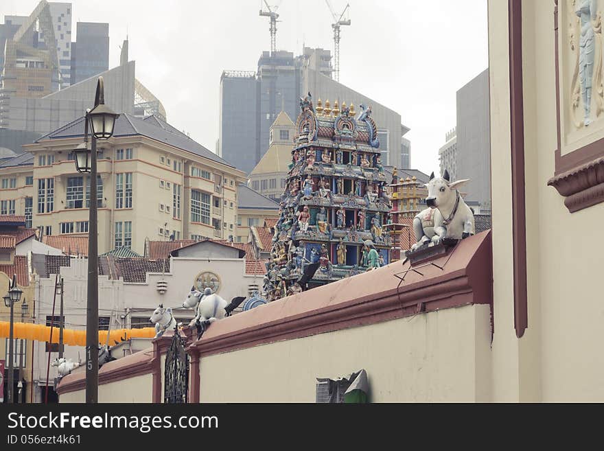 Singapore Chinatown architecture with famous Sri Mariamman Hindu Temple wall on foreground