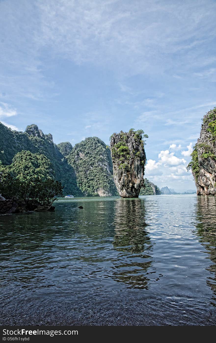 A view of islands of Phang Nga Bay, particularly James Bond Island (Koh Tapoo), Thailand. This island was made famous in the James Bond movie, The Man with a Golden Gun.