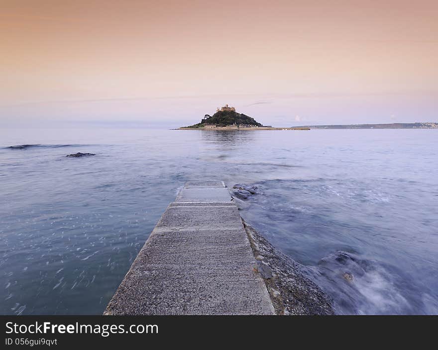 Image taken in Marazion, Cornwall, 2009. The idea behind this image is to lead the viewers eye towards the Mount by following the lines of the causeway. A long exposure was used to create movement of the waves. Image taken in Marazion, Cornwall, 2009. The idea behind this image is to lead the viewers eye towards the Mount by following the lines of the causeway. A long exposure was used to create movement of the waves.