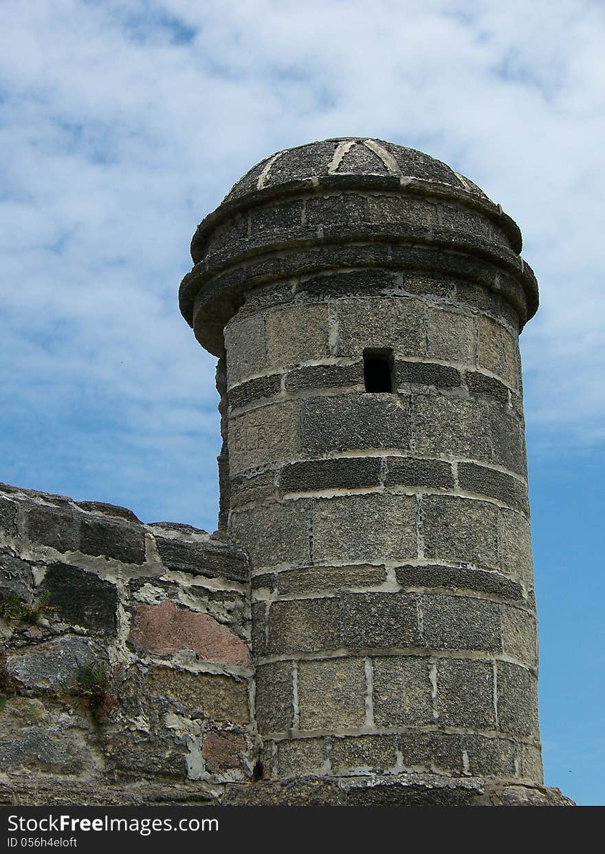 Visiting fort matanzas in north florida, i zoomed in on the lookout with the cloudy sky above to give it contrast. note the coquina bricks which make up the fort, and allow it to withstand cannon shots. Visiting fort matanzas in north florida, i zoomed in on the lookout with the cloudy sky above to give it contrast. note the coquina bricks which make up the fort, and allow it to withstand cannon shots