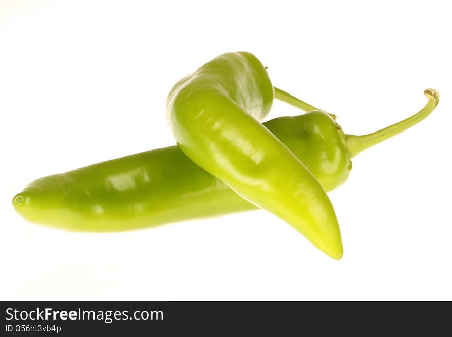 Green pepper on white background