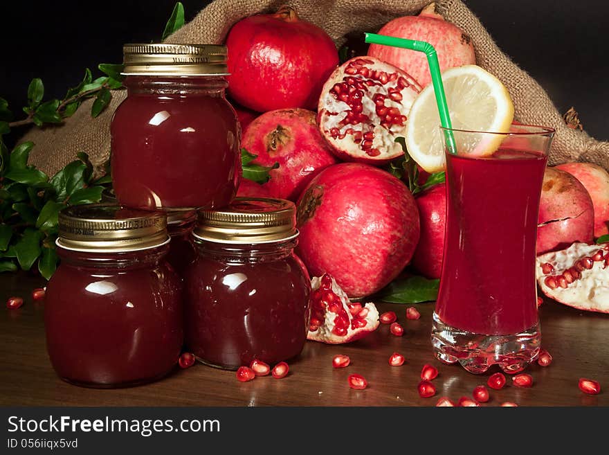 Fresh ripe pomegranate and juice in the glass. Fresh ripe pomegranate and juice in the glass