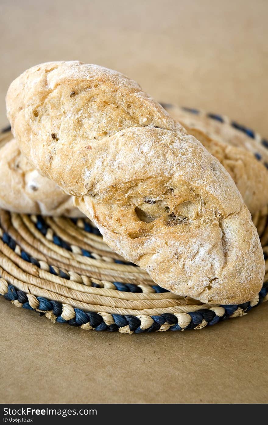 Close up wheat bread on brown background