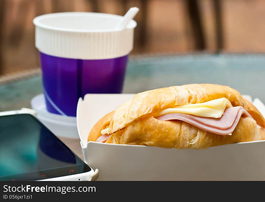 Ham cheese croissant placed on the table. Ham cheese croissant placed on the table.