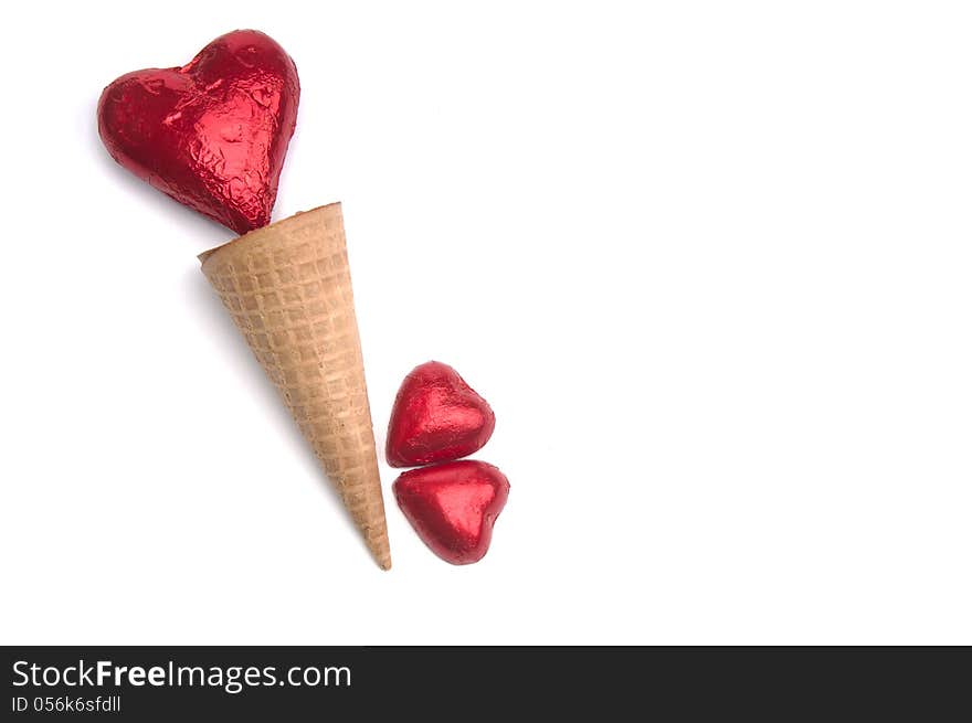 Red Heart in a ice cream cone with two small red hearts. Red Heart in a ice cream cone with two small red hearts