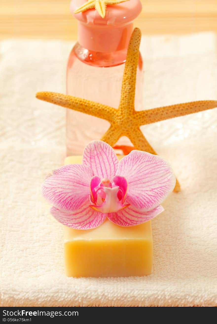 Bars of soap with orchid flower and towel. Bars of soap with orchid flower and towel