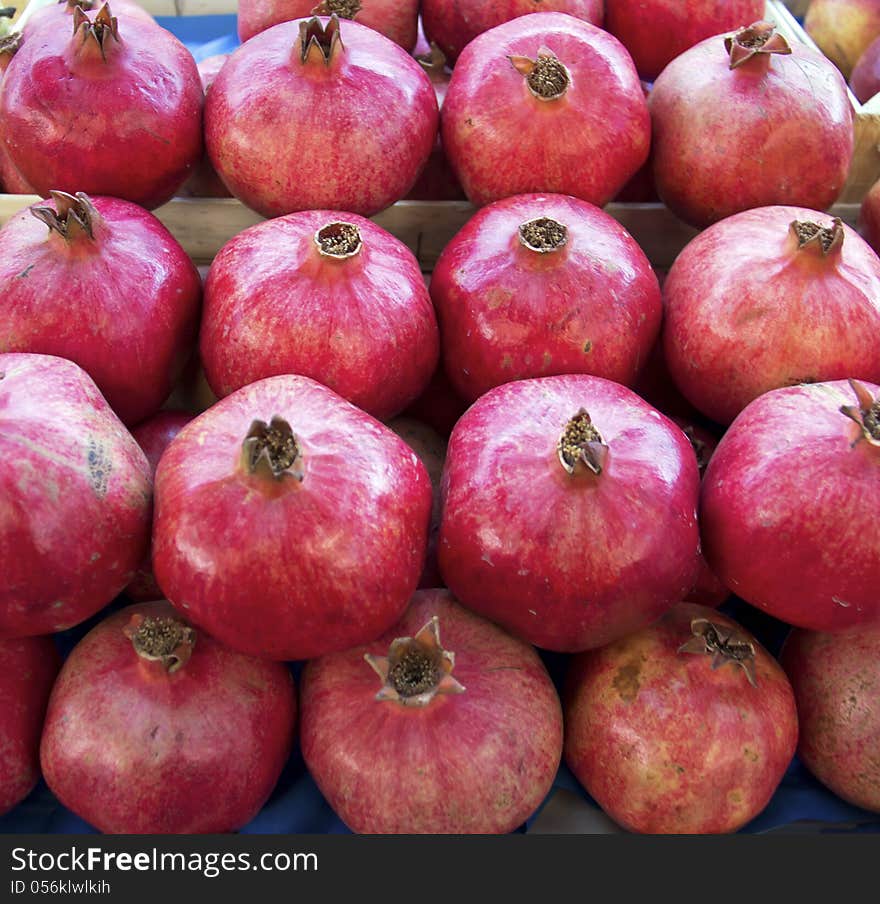 Close up of pomegranates on market stand