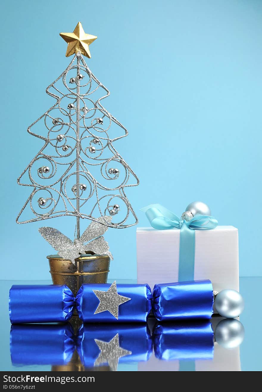 Blue theme Christmas gift and bauble decorations - vertical.