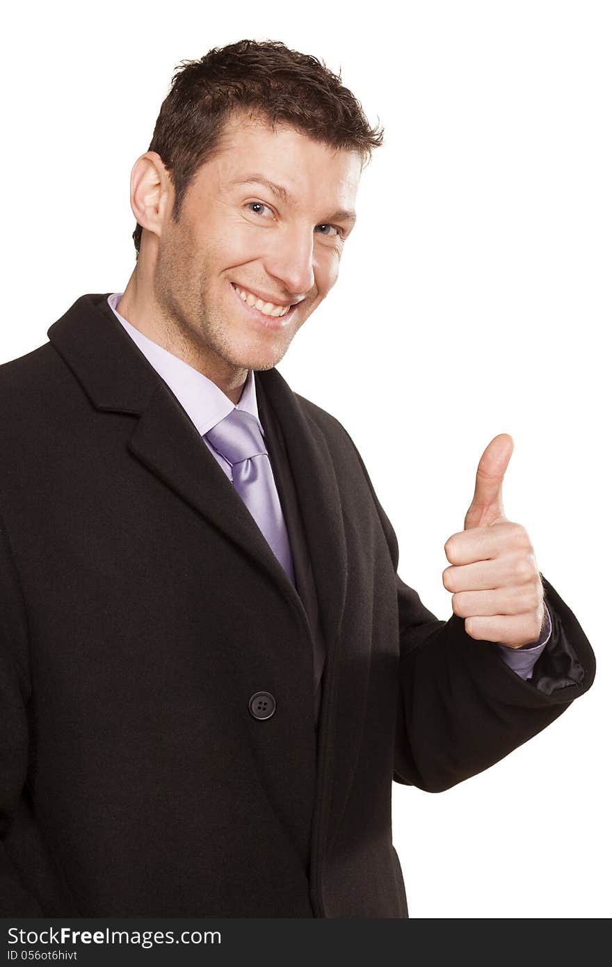 Sucefull smiling businessman in coat showing thumbs up on white background. Sucefull smiling businessman in coat showing thumbs up on white background