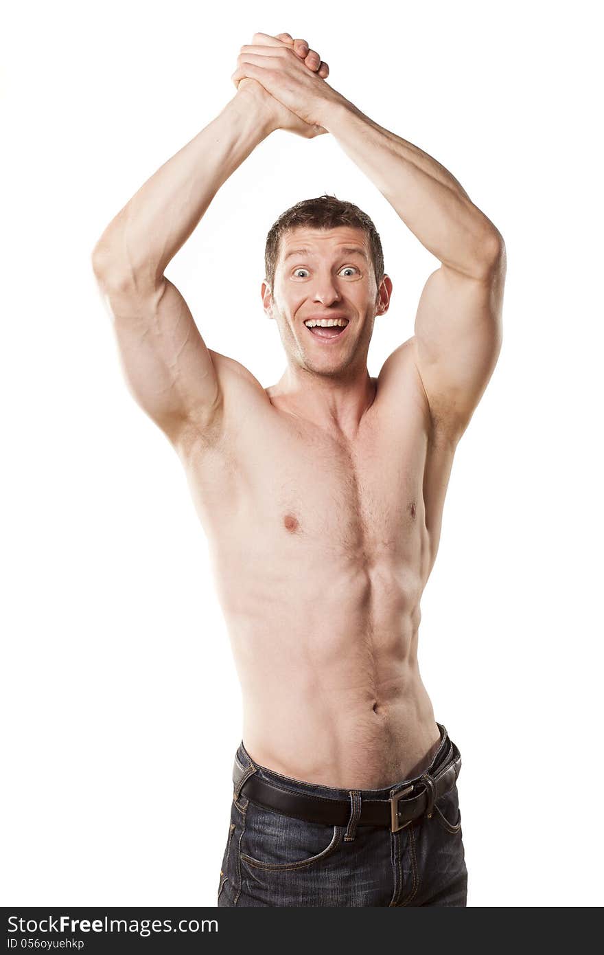 Young muscular macho man posing with naked torso on white background. Young muscular macho man posing with naked torso on white background