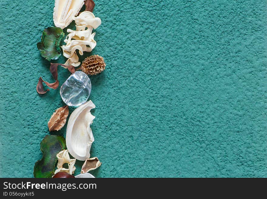 Green Textured Paper With Seeds And Leaves