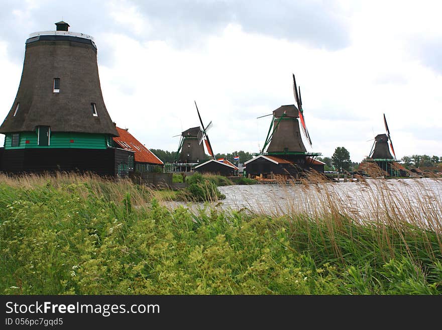 Zaanse Schans Historic Village, typical windmills in Holland, Europe. Zaanse Schans Historic Village, typical windmills in Holland, Europe