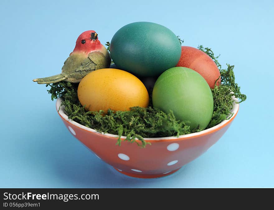 Easter Still Life With Rainbow Color Eggs Closeup Against A Blue Background.