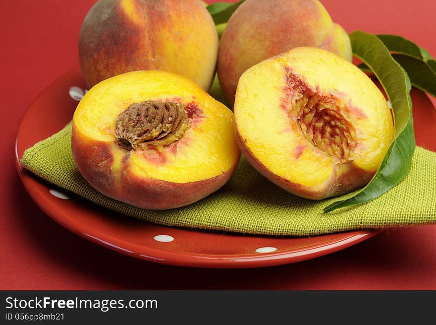 Plate of delicious fresh summer peaches fruit