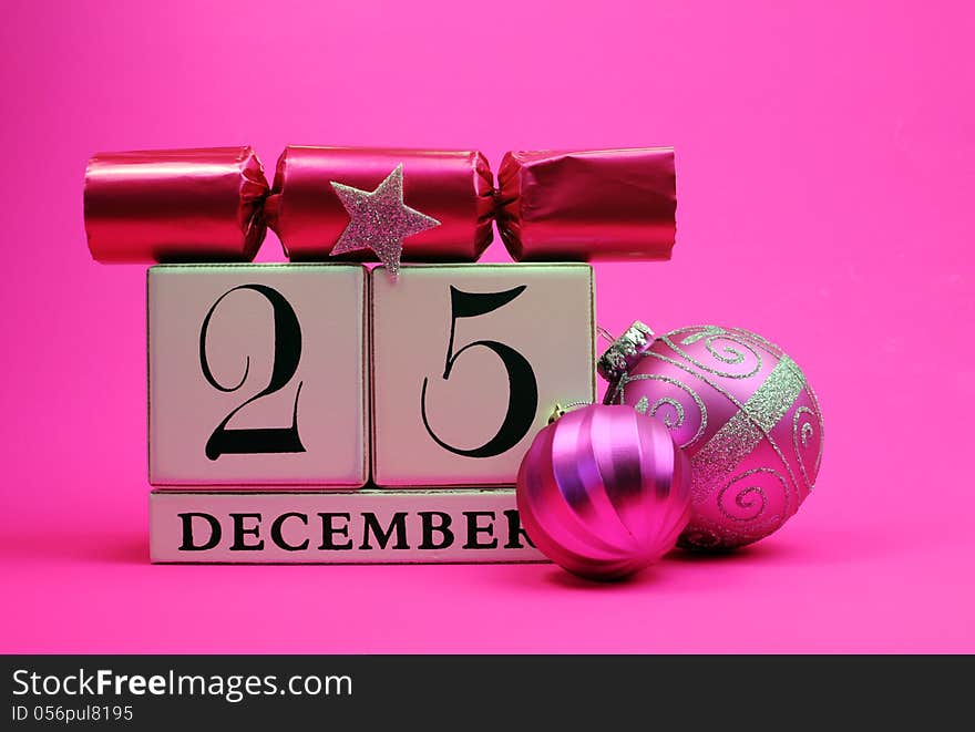 Pink theme save the date white calendar for Christmas Day, December 25, with festive bauble, pine and christmas cracker bon bon. Pink theme save the date white calendar for Christmas Day, December 25, with festive bauble, pine and christmas cracker bon bon.