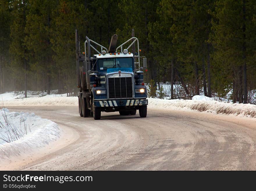 Empty Logging Truck Heading for more Logs