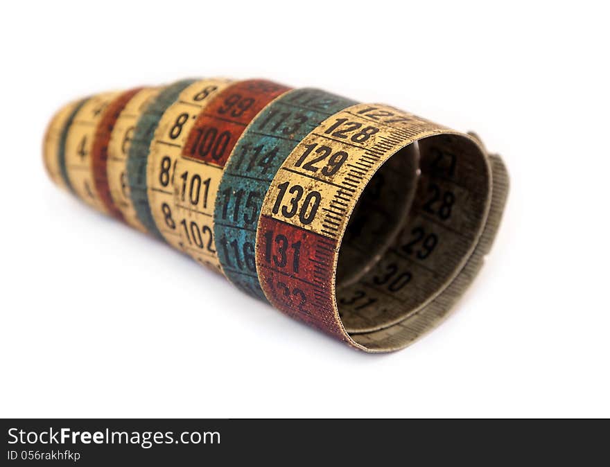 Isolated old tape measure on white background