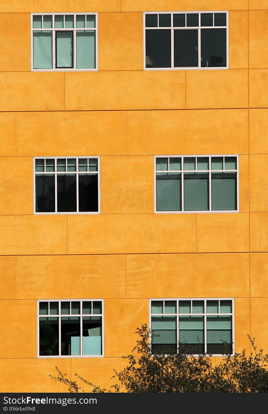 Orange Building With Stark Contrasting Windows