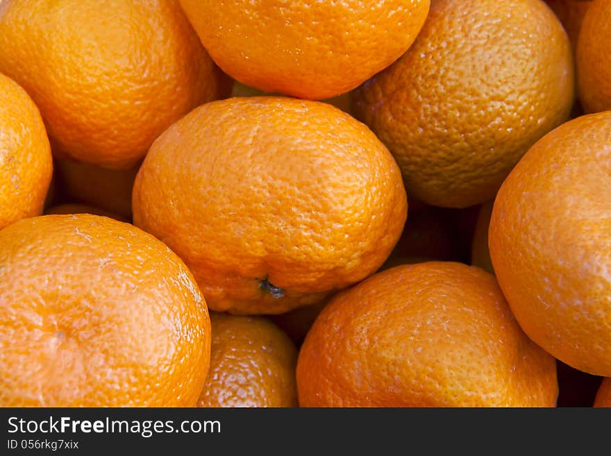 Bunch of fresh mandarin oranges on market